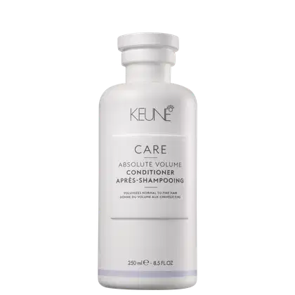 Frasco branco da linha Care da Keune, contendo Condicionador de Volume Absoluto. O rótulo apresenta o nome do produto e sua função de volumizar cabelos normais a finos.