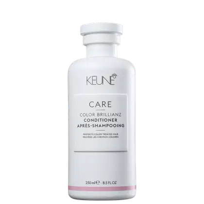 Frasco branco da linha Care da Keune, contendo condicionador para cabelos coloridos, com rótulo destacando "Color Brillianz Conditioner" e informações sobre a proteção da cor dos cabelos.