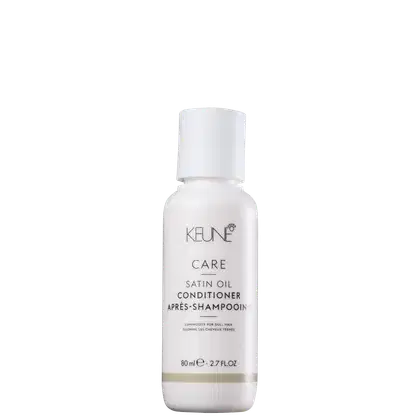 Frasco branco de condicionador Keune Care Satin Oil, com rótulo em preto e dourado, contendo 80 ml do produto.