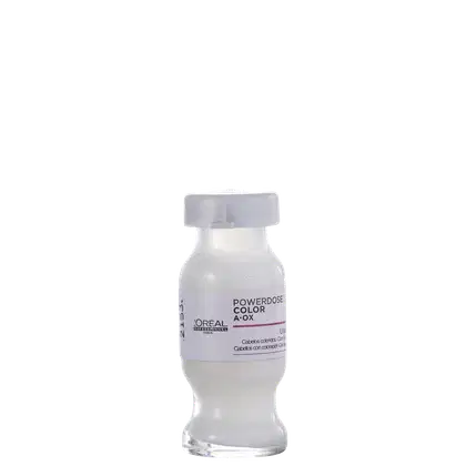 Frasco de vidro branco com tampa branca. Rótulo com texto "POWERDOSE COLOR A-OX L'OREAL PROFESSIONNEL" em letras pretas. Produto de perfumaria com informações sobre cor e tratamento para cabelos.