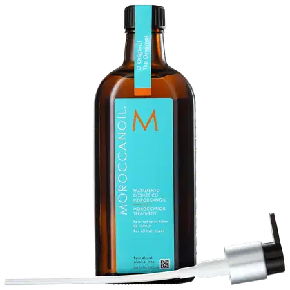 A imagem mostra o Óleo Cpailar Moroccanoil em frasco âmbar de 200ml. Embalagem retangular com rótulo azul turquesa e logotipo M em laranja. Na parte de baixo, um aplicador de plástico branco e preto acompanha o frasco.
