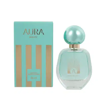 Frasco de perfume Aura Beauty com tampa esférica em tom azul-esverdeado, embalado em caixa de papelão na mesma cor predominante, com detalhes dourados no rótulo.
