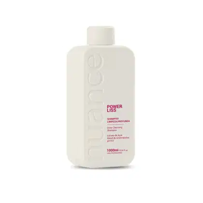 Shampoo da marca Nuance Professional, chamado "Power Liss". A embalagem é um frasco branco com o nome da marca e do produto destacados. O frasco possui um formato cilíndrico e contém 1L