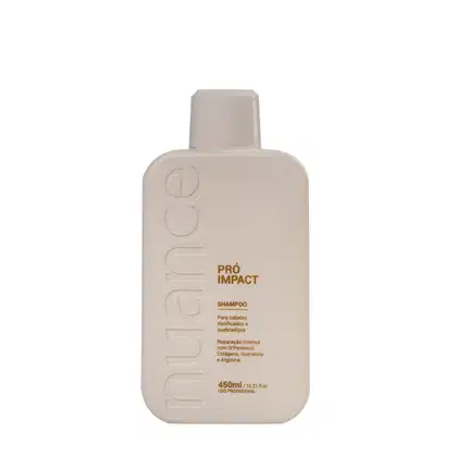 Shampoo da linha Pro Impact da marca Nuance Professional. O frasco possui um rótulo com informações indicando que se trata de um shampoo para cabelos danificados e ressecados, com fórmula reparadora contendo D-pantenol, colágeno, queratina e arginina.
