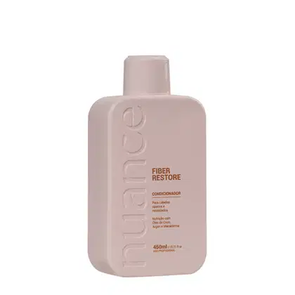 Condicionador da linha Fiber Restore da marca Nuance Professional. O frasco possui um formato retangular com um bico dispensador na parte superior. O tamanho do produto é de 450ml, conforme indicado no rótulo.