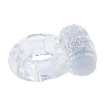 Anel peniano transparente com textura ondulada. Produto da marca Sexy Import, com design ergonômico e material flexível.