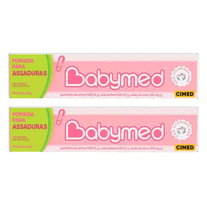 Duas caixas de pomada para assaduras da marca Babymad, com embalagem rosa e verde, contendo informações sobre os ingredientes e indicações de uso pediátrico.