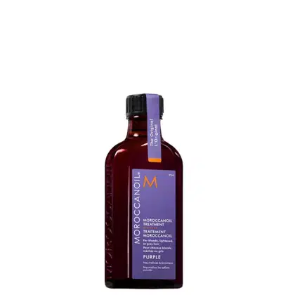 Frasco de tratamento de óleo de argan Moroccanoil na cor roxa, com rótulo destacando o tratamento para cabelos loiros, claros ou grisalhos.
