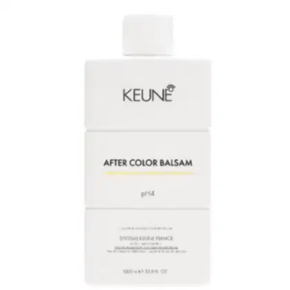 Frasco branco do produto After Color Balsam da marca Keune, com rótulo destacando o nome da marca e o tipo de produto.