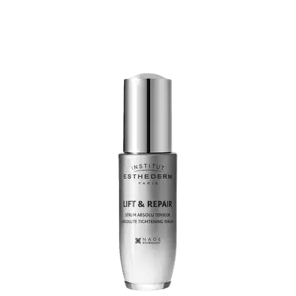 Frasco de vidro prateado contendo o sérum Lift & Repair da marca Institut Esthederm Paris. O rótulo destaca o nome do produto e a promessa de "Sérum Absolut Tenseur" (Sérum Tensor Absoluto).