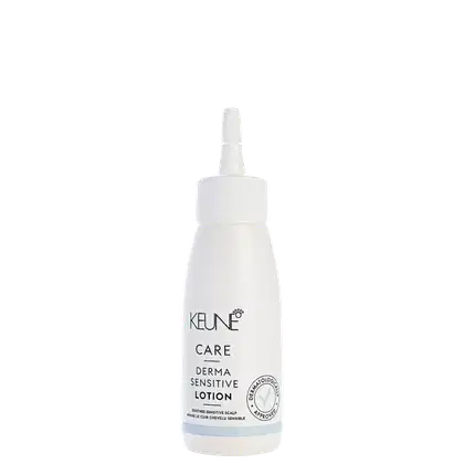 Frasco branco de loção Keune Care Derma Sensitive, com rótulo preto e branco. O produto é indicado para cuidados com o couro cabeludo sensível.
