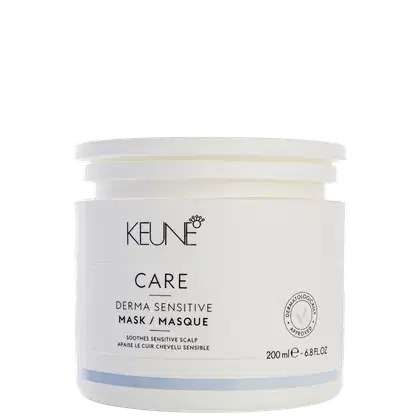 Frasco branco da linha Keune Care, contendo máscara para couro cabeludo sensível, com rótulo em preto e branco indicando o nome do produto e sua função de acalmar o couro cabeludo sensível.