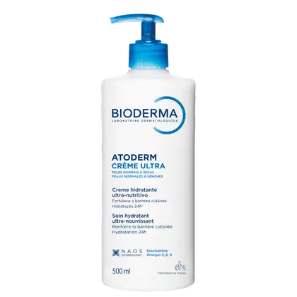 Frasco branco com bomba doseadora azul, rótulo com marca Bioderma e nome do produto "Atoderm Crème Ultra" para peles normais a secas, creme hidratante ultra-nutritivo.