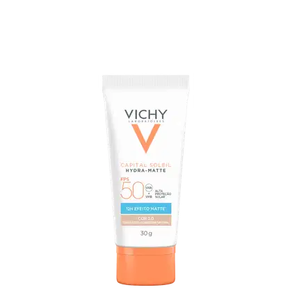 Tubo de protetor solar facial Vichy Capital Soleil Hydra-Matte, com FPS 50 e acabamento matte, na cor 2.0, em embalagem branca e laranja com logotipo da marca.