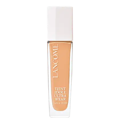Frasco de maquiagem Lancôme Teint Idole Ultra Wear, com embalagem branca e detalhes em laranja, contendo o texto "Care & Glow" e a descrição do produto.