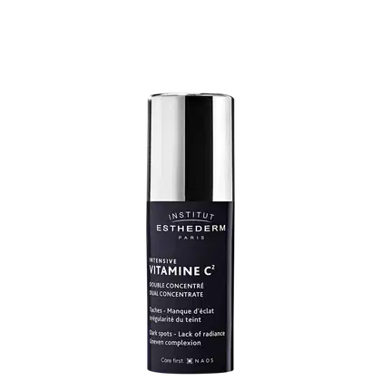 Frasco de tratamento intensivo de vitamina C2 da marca Esthederm. Embalagem preta e branca com texto destacando os benefícios do produto para manchas e falta de luminosidade da pele.