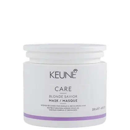 Embalagem branca cilíndrica da linha Keune Care, contendo máscara para cabelos loiros "Blonde Savior". Rótulo com nome do produto e descrição em inglês sobre recuperação intensa para cabelos porosos e descoloridos.