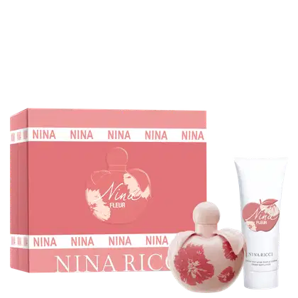 Conjunto de produtos Nina Ricci Nina Fleur. Frasco de perfume transparente em formato de coração com detalhes florais vermelhos. Loção corporal branca em tubo cilíndrico com o nome "Nina Fleur" impresso.