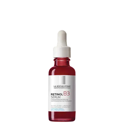 Frasco de vidro vermelho com conta-gotas branco contendo sérum de retinol B3 da marca La Roche-Posay, um produto antirrugas uniformizador e restaurador.
