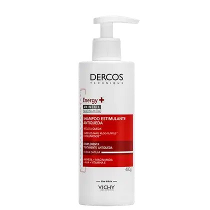 Frasco branco com bomba doseadora da marca Dercos Technique, contendo shampoo estimulante antiqueda com Aminexil, Niacinamida, AHA e Vitamina E, para reduzir a queda e aumentar o volume dos cabelos.