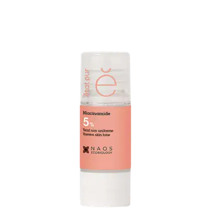 Produto de beleza da marca État Pur, em embalagem branca e rosa, contendo 5% de niacinamida para uniformizar o tom da pele. O rótulo destaca o nome do produto e a marca Naos Ecobiology.