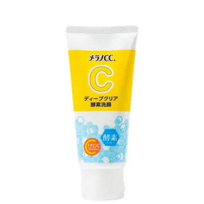 Tubo de produto de limpeza facial da marca Melano CC, com embalagem branca e amarela destacando o ingrediente vitamina C. O rótulo apresenta informações sobre o produto em japonês.