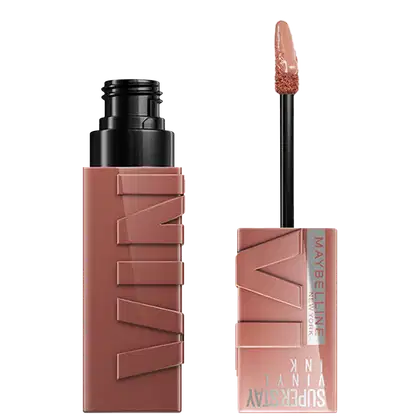 Produto de maquiagem Maybelline Super Stay Vinyl Ink, com embalagem preta e rosa, contendo um aplicador de ponta macia para aplicação do produto líquido de longa duração.