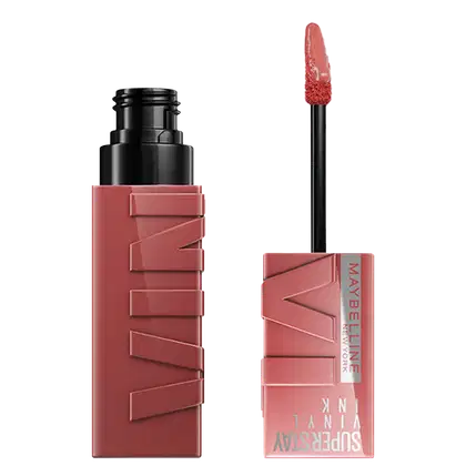 Produto de maquiagem Maybelline Super Stay Vinyl Ink, com embalagem preta e rosa, contendo um aplicador de pincel para lábios em formato cônico