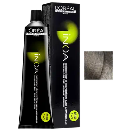 Frasco de item de perfumaria da marca L'Oréal Professionnel, com embalagem preta e verde, contendo produto coloração para cabelos, com texto legível no rótulo.