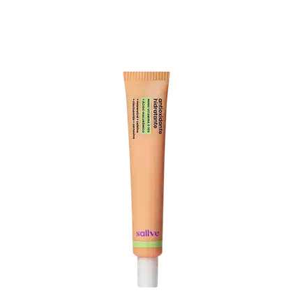 Tubo de creme hidratante da marca Sallve, com embalagem de cor laranja e verde, contendo informações sobre o produto em texto preto.