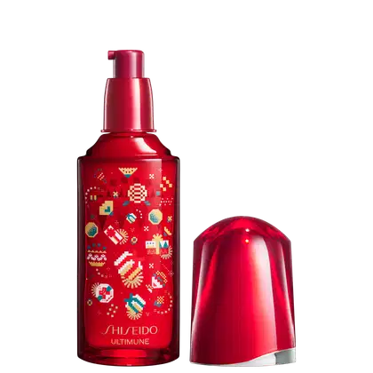 Sérum Facial Shiseido Ultimune. Frasco vermelho brilhante com bomba dosadora. O frasco apresenta um design decorativo com ícones coloridos, como flores e caixas de presente.