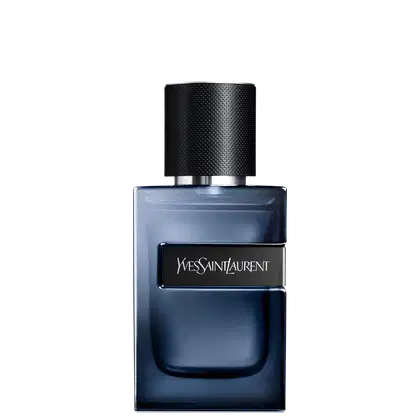 Frasco de perfume Yves Saint Laurent em tom azul escuro com rótulo preto destacado. Embalagem cilíndrica com tampa preta e textura de fibra de carbono. Produto de beleza da marca de luxo francesa.