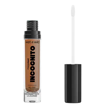 A imagem mostra um corretivo líquido da marca de cosméticos Wet n Wild chamado "Incognito". O produto é descrito como "Cobertura Total o Dia Todo" e apresenta um aplicador em forma de pincel integrado à embalagem.
