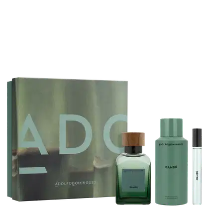 Produtos lado a lado, com caixa quadrada branca e imagem detalhada de bambu e nome da marca em branco. Frascos de perfumes, com tampa de madeira e outro preto, vidro degradê transparente e verde. Desodorante em embalagem verde e escritos pretos.