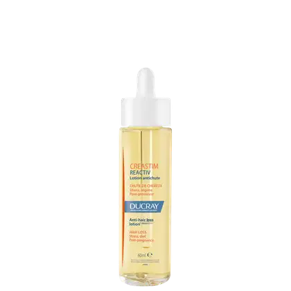A imagem mostra um frasco transparente contendo um líquido amarelo claro. É o "Creastim Reactiv", da marca Ducray. Trata-se de uma loção antiqueda de cabelo. O frasco tem um aplicador em formato de conta-gotas na parte superior e 60ml de produto.
