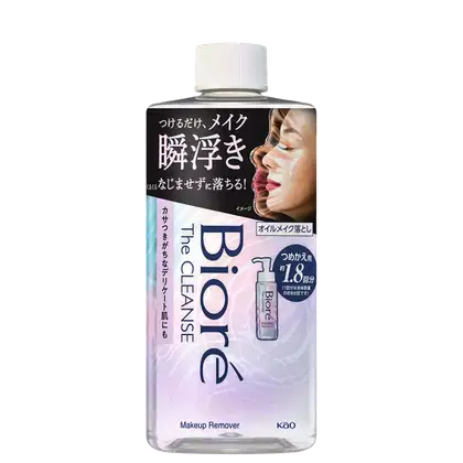Imagem mostra o frasco de Demaquilante Biore The Cleanse em destaque. O frasco exibe o logo da marca e do produto e inscrições em outra língua. O frasco possui a tampa redonda e é multicolorido com rosa e azul.