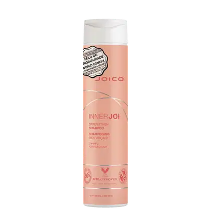O Shampoo Joico InnerJoi Strengthen (300ml) destaca-se em sua embalagem laranja claro com detalhes em branco e prata.