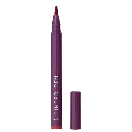 A imagem mostra a caneta batom Tinted Pen da Océane, em embalagem plástica roxa em formato de caneta. O nome "Tinted Pen" está impresso em letras brancas na lateral da embalagem.