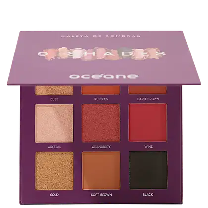 Paleta de sombras Océane. Embalagem retangular roxa. Contém 9 cores: bege claro (Crystal), vermelho (Cranberry), marrom escuro (Dark Brown), dourado (Gold), marrom claro (Soft Brown), preto (Black), bege rosado (Dust), laranja (Pumpkin) e vinho (Wine).