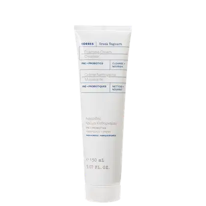 Tubo de creme de limpeza espumante da marca Korres, com rótulo em inglês e grego indicando ingredientes pré e probióticos. Embalagem branca com detalhes azuis, contendo 150 ml do produto.