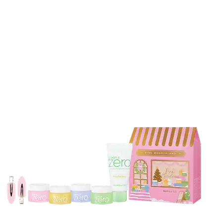 Duas presilhas de cabelo, 4 potes de balm de limpeza, uma espuma de limpeza e uma embalagem em formato de casinha colorida e natalina na cor rosa.