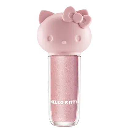 Maquiagem em formato cilíndrico com a cabeça da personagem Hello Kitty como tampa. A parte superior é rosa com detalhes em relevo que representam os olhos, orelhas e laço da Hello Kitty. É possível ver a cor do produto pelo corpo transparente.