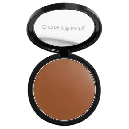 A imagem mostra uma embalagem aberta de bronzer cremoso. A embalagem é preta com parte transparente e o logo da marca em branco.