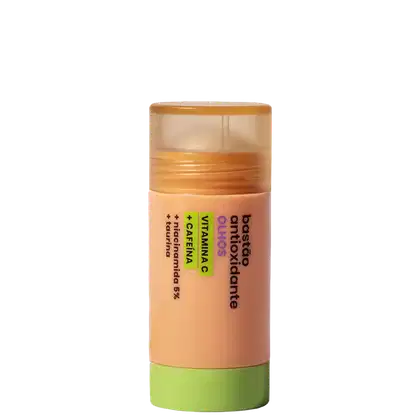 Barra de vitamina C da marca Sallve, em embalagem cilíndrica de plástico transparente com tampa laranja e detalhes verdes, contendo 15g de produto.