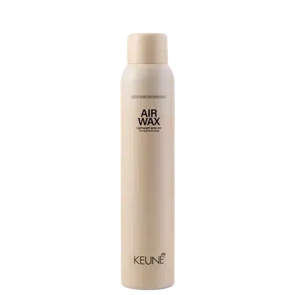 A imagem mostra a cera em spray Style Air Wax da marca Keune. Embalagem em forma de lata aerossol cilíndrica na cor bege claro.