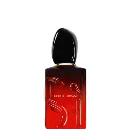 O frasco possui um formato retangular com uma tampa oval, com a marca "Giorgio Armani" impressa em destaque. A cor predominante é o vermelho escuro, com um acabamento brilhante.