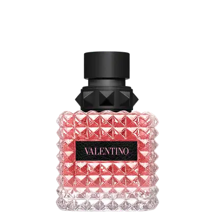 Frasco de perfume Valentino com design geométrico em vidro rosa e detalhes em preto, contendo o nome da marca em destaque.