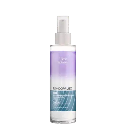 Frasco de spray da linha Blondorplex da Wella Professionals, com fórmula para proteção anti-frizz para cabelos loiros. Embalagem de plástico branco com detalhes em roxo e azul, contendo 145ml do produto.