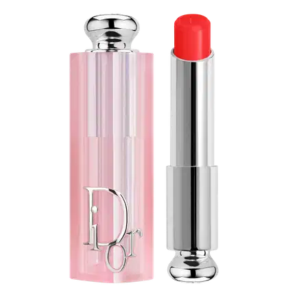 Possui uma embalagem rosa clara com detalhes prateados, incluindo o logotipo da marca.