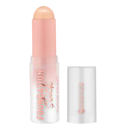 Produto de maquiagem Essence em embalagem rosa e branca, com texto "Foundation Stick" e "Essence" visível. Formato de bastão com ponta arredondada, indicando ser um produto de base ou corretivo.
